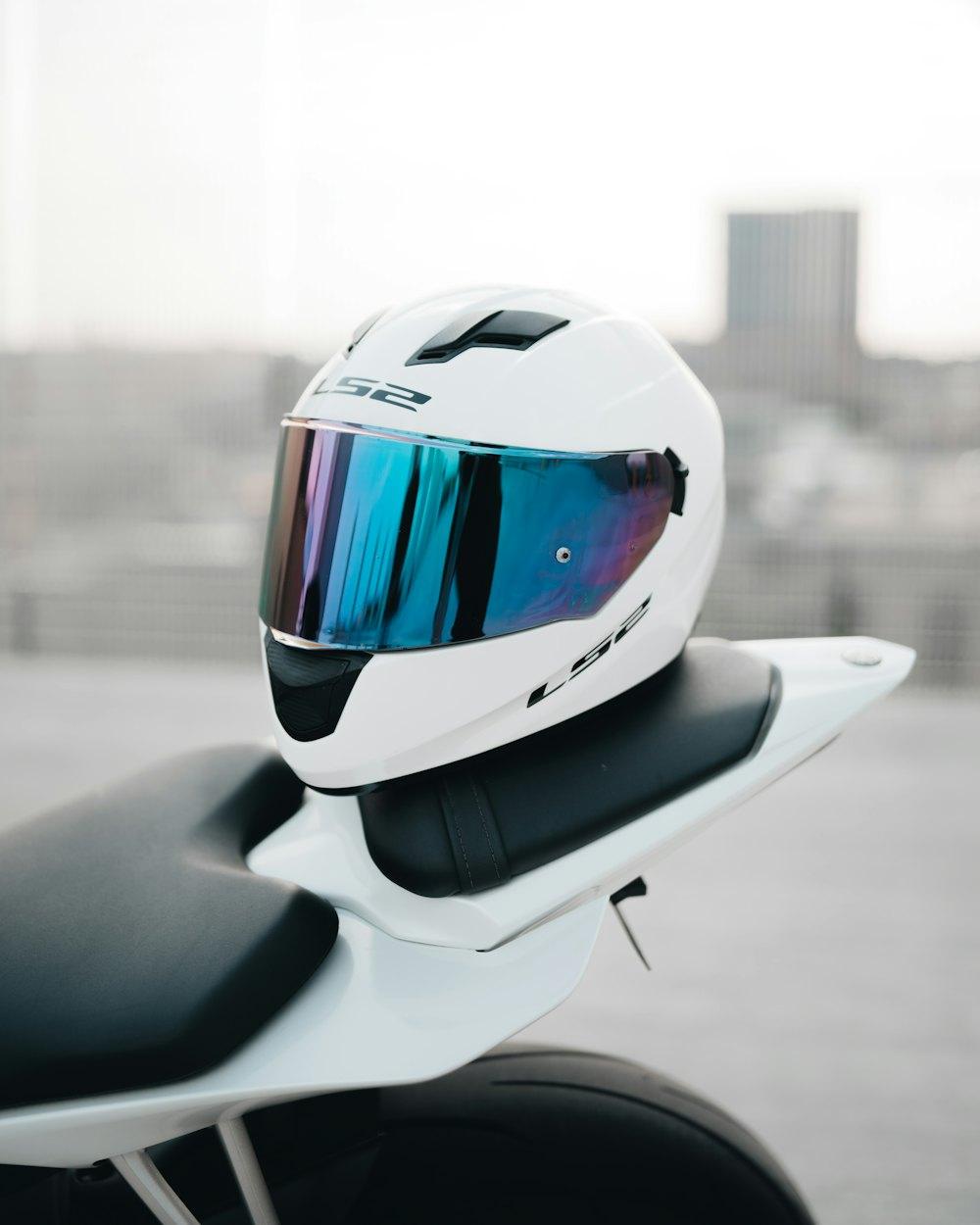 White helmet with a mirrored visor