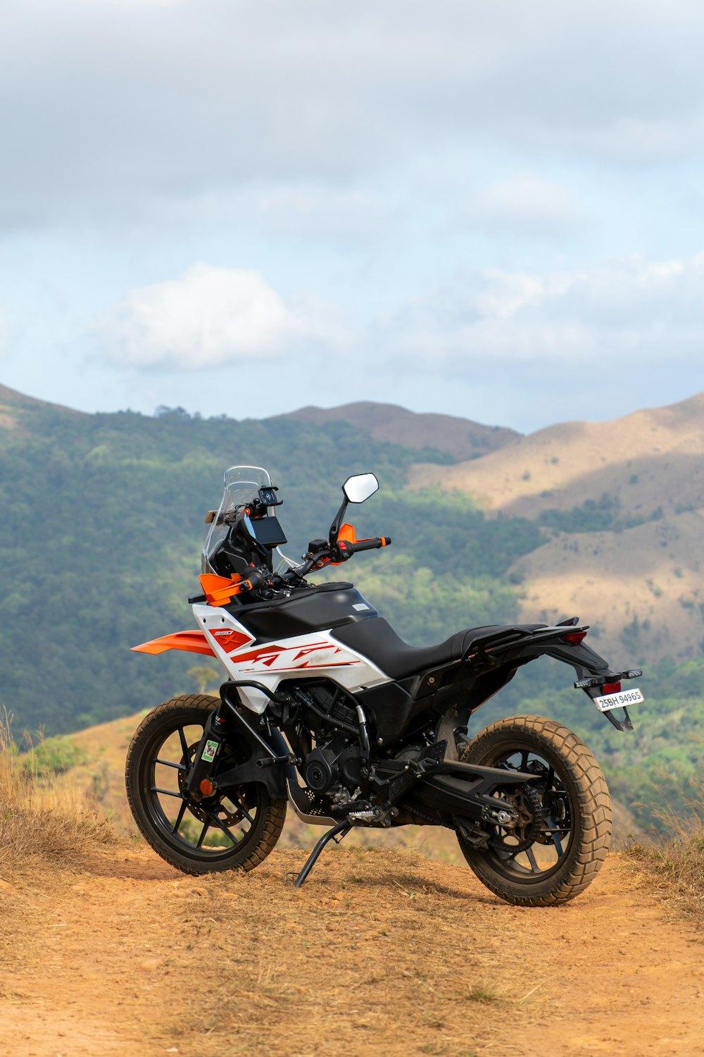 Adventure bike parked on a hilltop dirt path